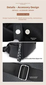 Detail of silver buckles, litchi grain leather texture and nylon strap on black backpack
