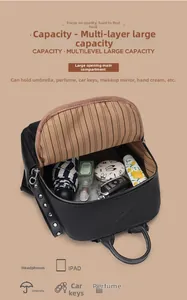 Top view of large capacity black lychee leather backpack showing spacious interior storage