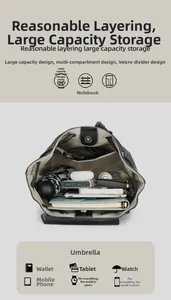 Detail showing the spacious interior compartments of the black leather commuter backpack