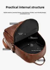 Detailed view of the brown leather backpack showing internal pockets and multi-zipper structure