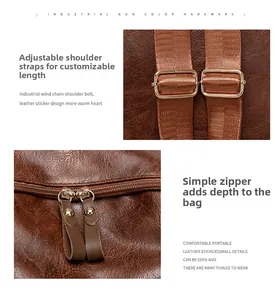 Detail of retro brown leather bag with adjustable woven strap and metal hardware
