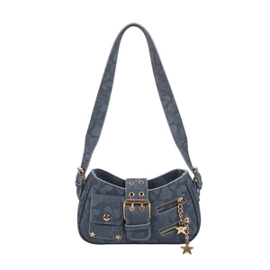 Blue denim butterfly print shoulder bag with gold star charms and punk rivet hardware