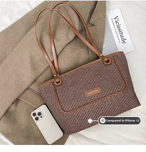 Macro shot of a brown woven tote bag featuring a leather logo patch and size comparison