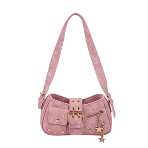 Pink Y2K star rivet hobo bag with gold chain charms and metal buckles on white background