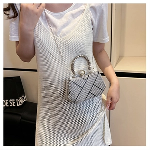 Silver rhinestone evening clutch with pearl clasp and chain strap detail view