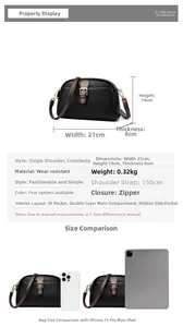 Size comparison of black litchi leather bag with iPhone and iPad for dimension reference