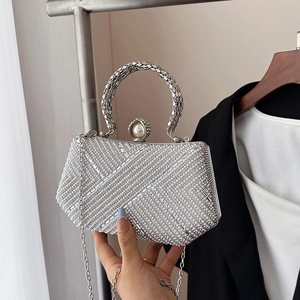 Luxury white pearl evening clutch with rhinestone diagonal patterns and silver metal handle