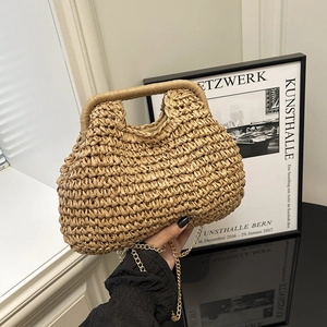 Handcrafted straw woven handbag in beige with a detachable gold chain shoulder strap