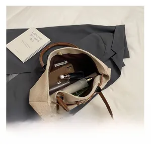 Interior view of large capacity canvas tote bag showing spacious room for essentials