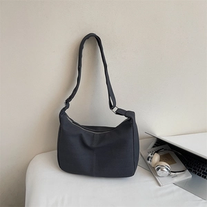 Large dark grey chevron textured tote bag with adjustable strap for casual daily use