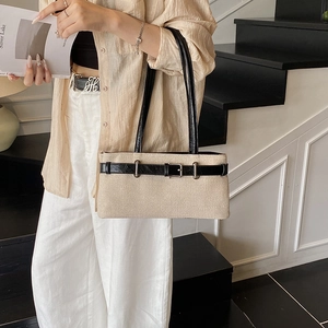 Sac fourre-tout tissé beige minimaliste avec lanières en cuir noir pour le quotidien