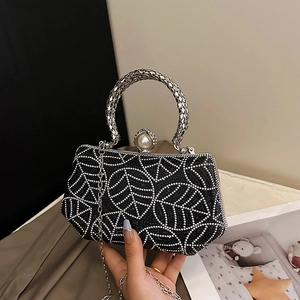 Elegant black evening bag with leaf rhinestone pattern and silver snake-textured handle