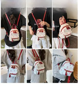 Detailed views of mini woven backpack with red bow patterns and leather straps