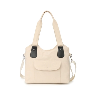 Grand sac cabas beige en toile avec détails en cuir noir et rivets pour femmes