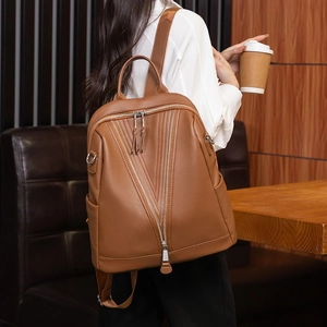 Brown soft leather backpack for women with unique V-shape double zipper design