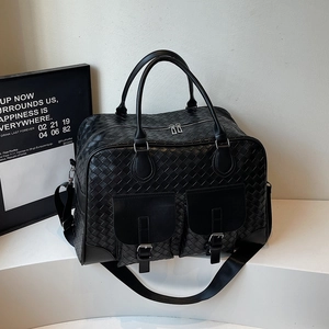 Black woven leather large capacity commuter tote bag with side pockets and shoulder strap