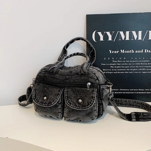 Retro washed denim crossbody bag with dual metal buckle pockets and top handles