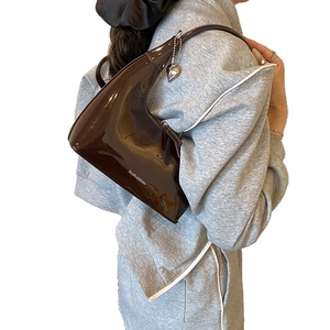Retro coffee patent leather moon bag with silver heart charm and minimalist shoulder strap