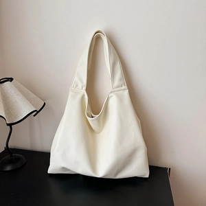 Minimalist off-white oversized tote bag in premium smooth PU leather for women