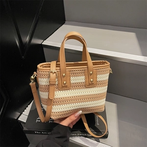 Retro hand-woven bucket bag with striped pattern and adjustable leather shoulder strap