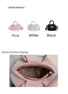 Detail view of multi-color bow handbags with pearl charms and interior lining storage