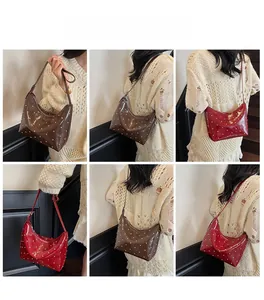 Detailed views of shiny rivet shoulder bag in brown and red showing styling options