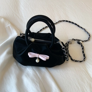 Elegant black satin handbag with pink bow and pearl pendant with silver chain strap