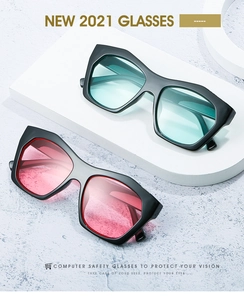 Detail of stylish polygonal computer safety glasses with black frames and tinted lenses