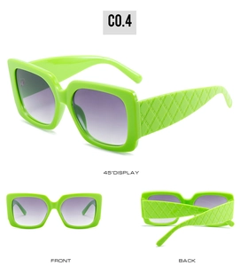 Vue sous trois angles de lunettes de soleil vert fluo avec branches à motif matelassé
