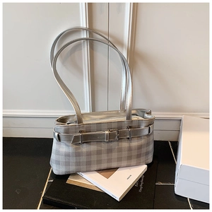 Silver checkered baguette bag with dual straps and a decorative metal buckle detail