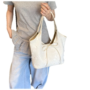 Floral canvas tote bag with 3D petal decorations and ribbon bow for summer fashion