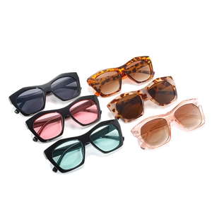 Collection of retro polygon sunglasses in various colors for stylish UV protection