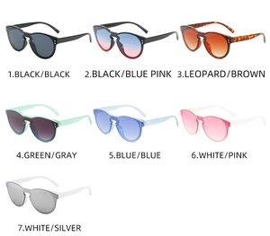 Detailed display of oversized wrap-around sunglasses in seven vibrant color variants