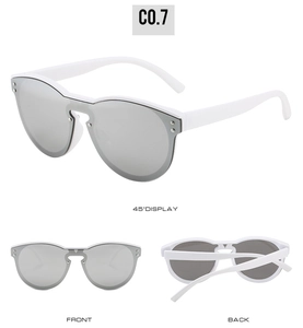 Detailed views of white oversized sunglasses with silver mirrored lenses and rivets
