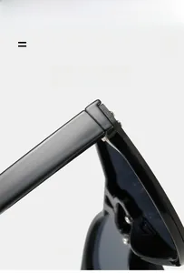 Macro view of high-elasticity hinge detail with metal rivets on black oversized sunglasses