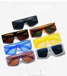 Macro view of oversized Y2K punk sunglasses in various vibrant candy colors