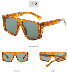 Three-angle view of oversized tortoiseshell flat top sunglasses with dark green lenses