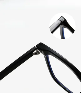 Detail showing reinforced metal hinge and blue accents on black TR90 eyewear frame