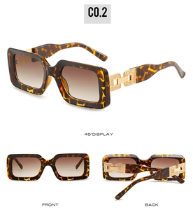 Detail view of tortoiseshell square sunglasses with gold hollow chain link temples