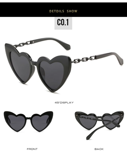 Detailed views of heart-shaped sunglasses featuring unique metal chain temples and black frames