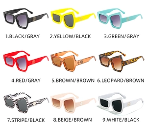 Grid view of oversized geometric sunglasses in nine colors with metal ring temple accents
