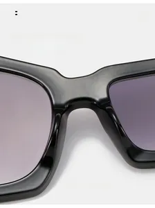Macro detail of comfortable integrated nose pads on black oversized sunglasses