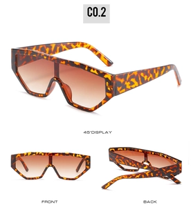 Three-way view of oversized tortoiseshell shield sunglasses with gradient brown lenses