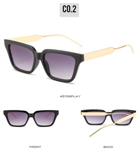 Square sunglasses with black frame, purple gradient lenses and gold metal temples detail