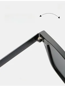 Detail of durable metal texture hinge on square frame sunglasses for smooth folding