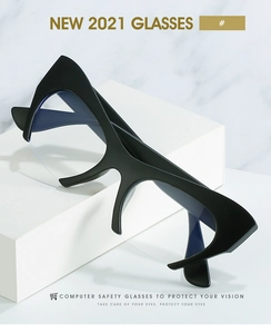 Detail of black cat-eye anti-blue light computer safety glasses with blue light reflection