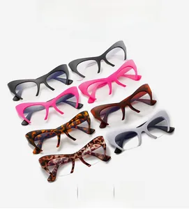 Matrix display of multi-colored half-frame cat eye glasses frames on a white background