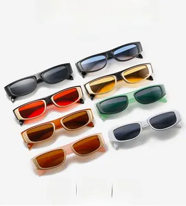 Flat lay of rectangle narrow sunglasses in multiple colors with sleek frames