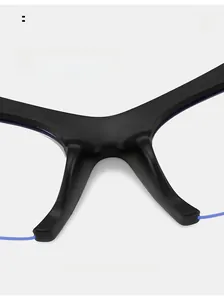 Detail of comfortable matte black nose pads with subtle purple accents on cat-eye glasses