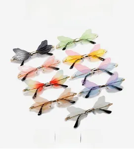 Collection of dragonfly wing rimless sunglasses in multiple gradient colors and metal frames